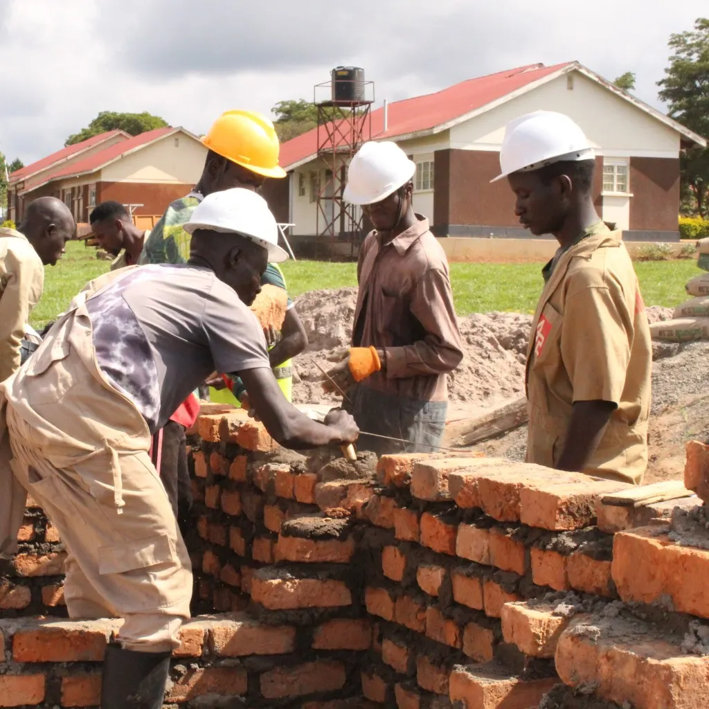 UTC Kyema students practising bricklaying