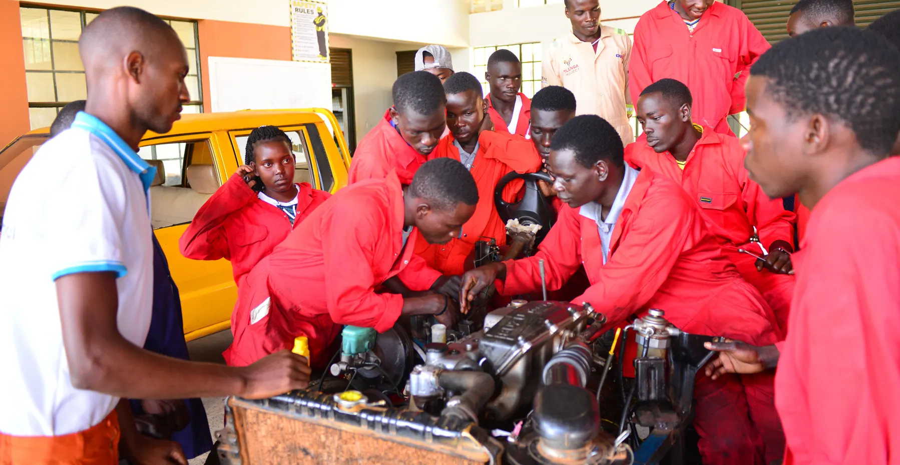 UTC Kyema students in an automotive workshop