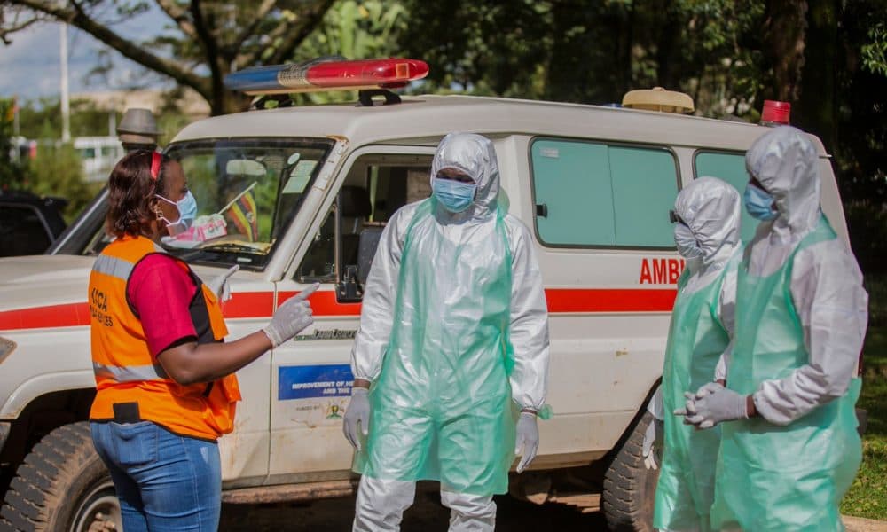 Makerere public-health field epidemiologists receiving a medical debrief