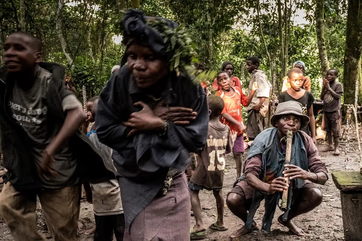 Batwa community members performing near Bwindi