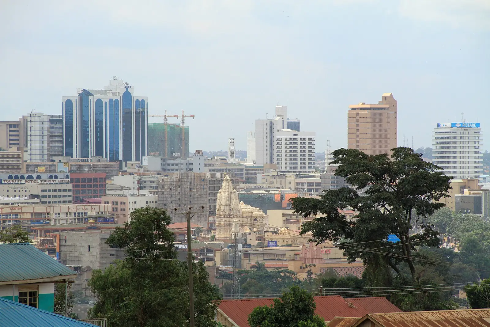 Kampala's skyline of office towers and green hills