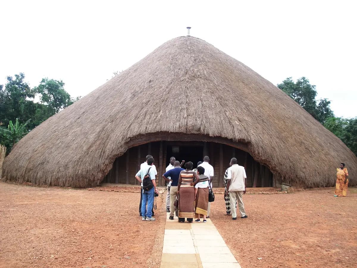 Visitors walking to the Kasubi tomb house