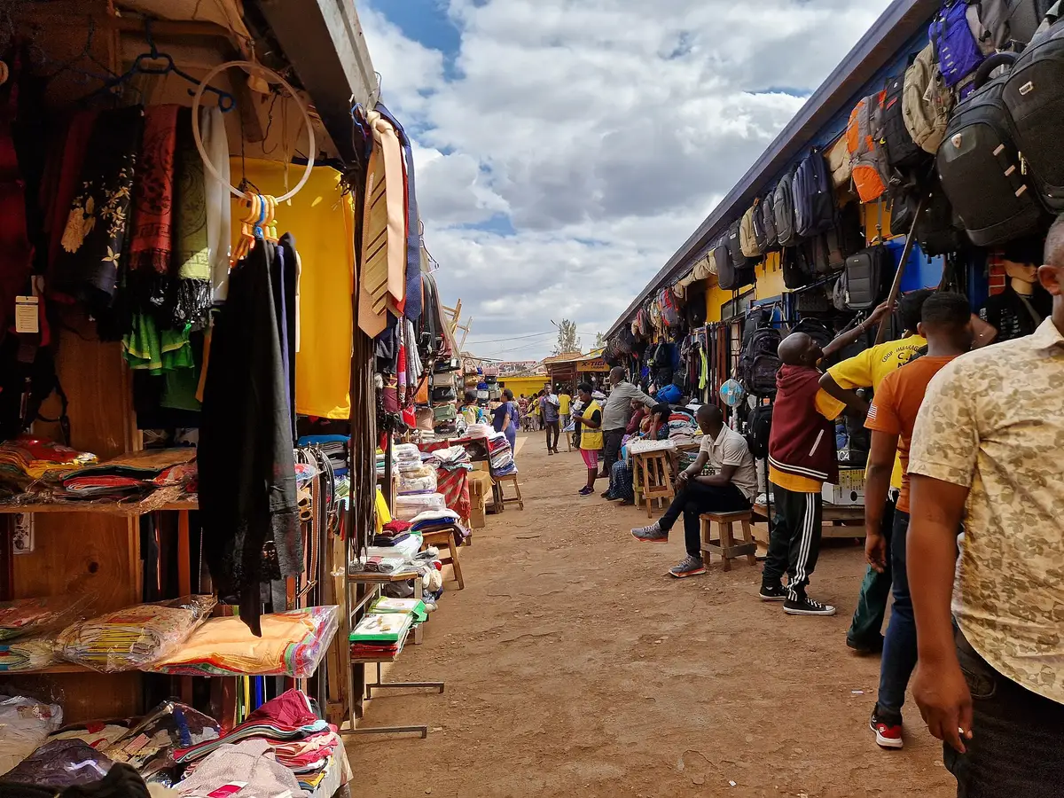 Stalls of clothes and fabric at Kimironko Market, Kigali