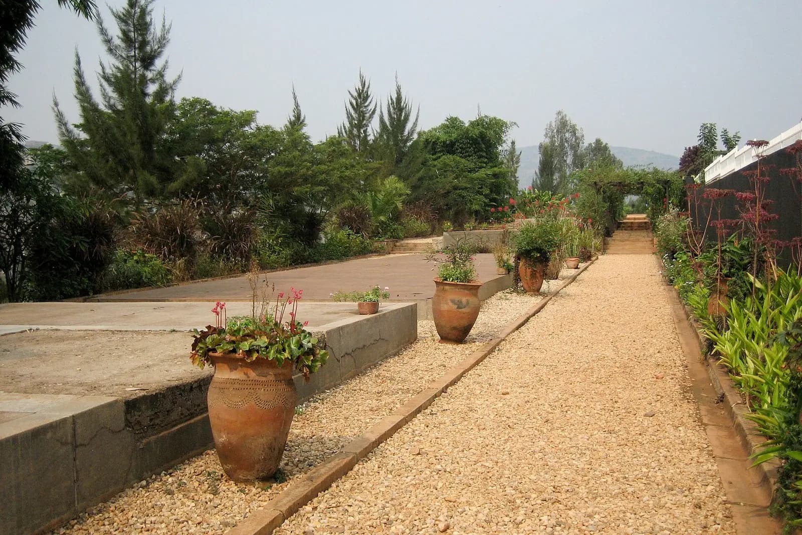 Concrete slabs covering mass graves in the gardens of the Kigali Genocide Memorial