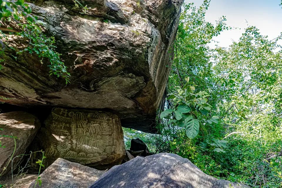 A painted boulder under a rock overhang at Kondoa