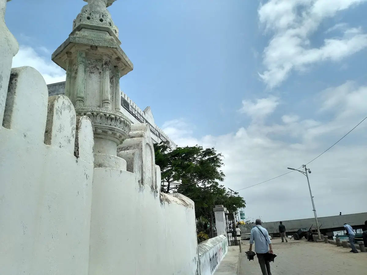 A white mosque minaret on the Lamu waterfront