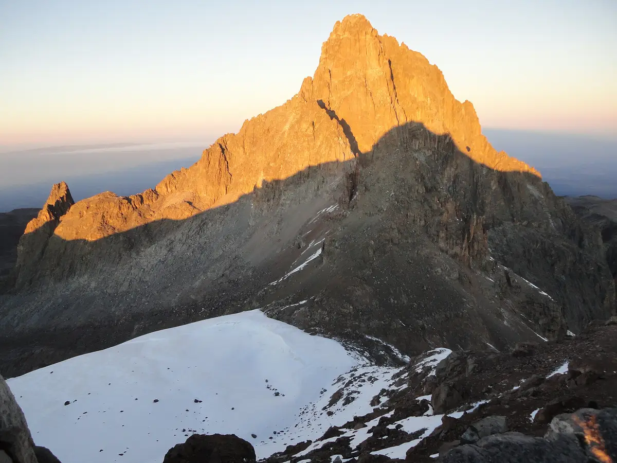 Sunrise lighting a Mount Kenya peak