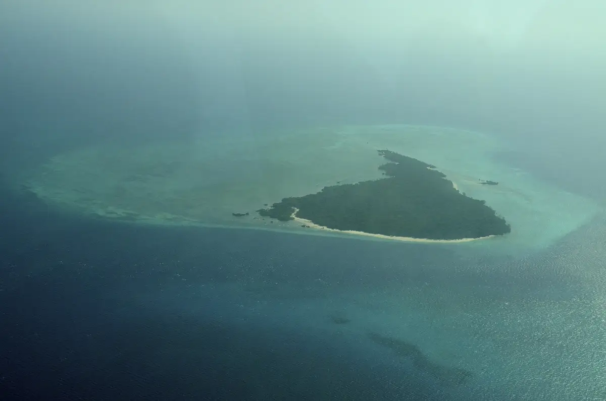 Misali Island and its reefs from the air