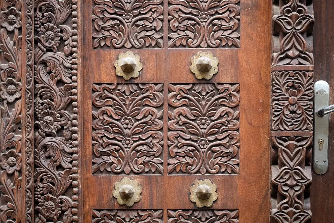 An ornately carved wooden door in Zanzibar