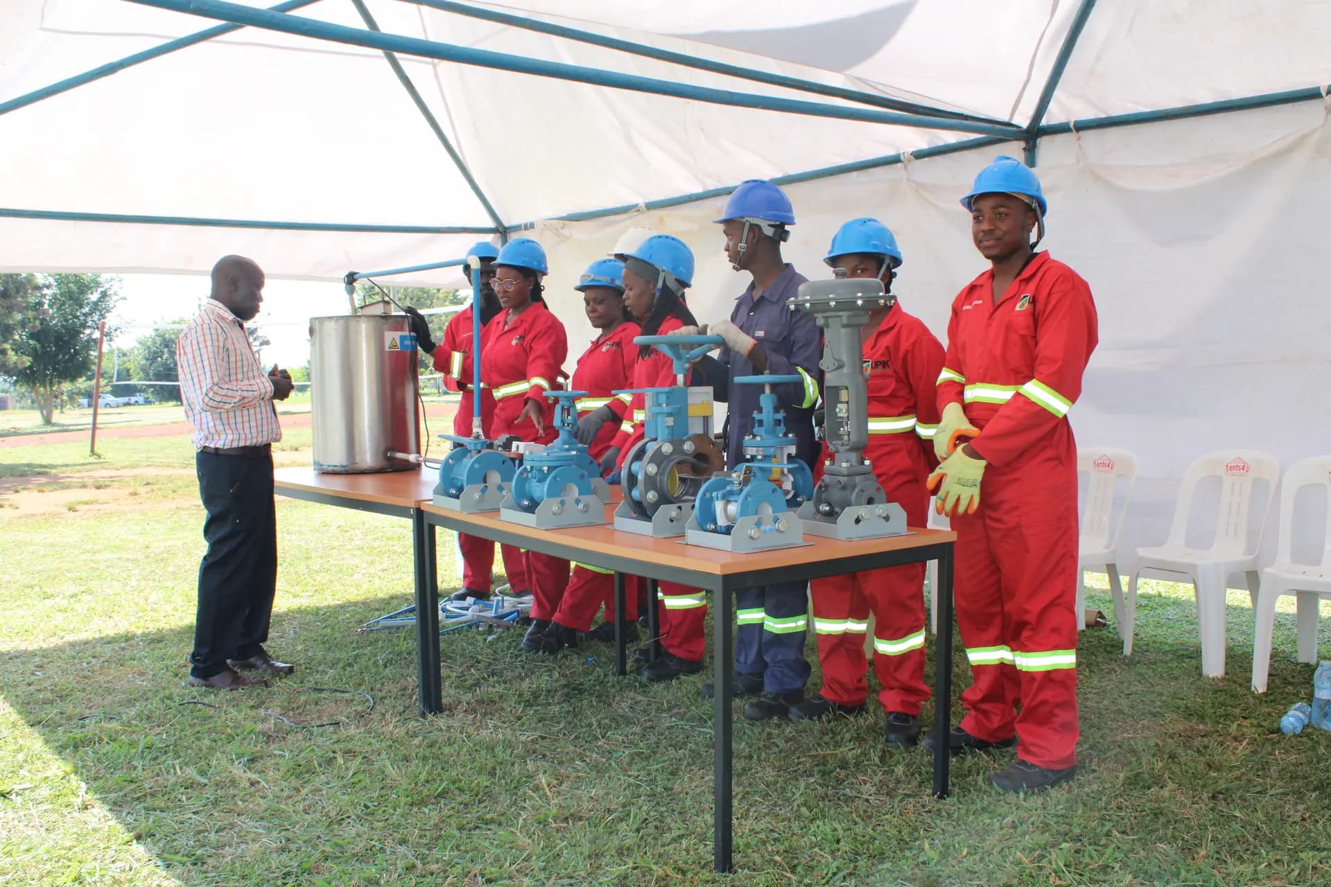 Uganda Petroleum Institute Kigumba students with training equipment