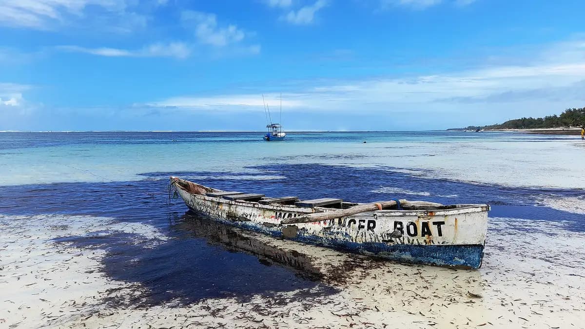 A wooden boat on the shallows at Diani