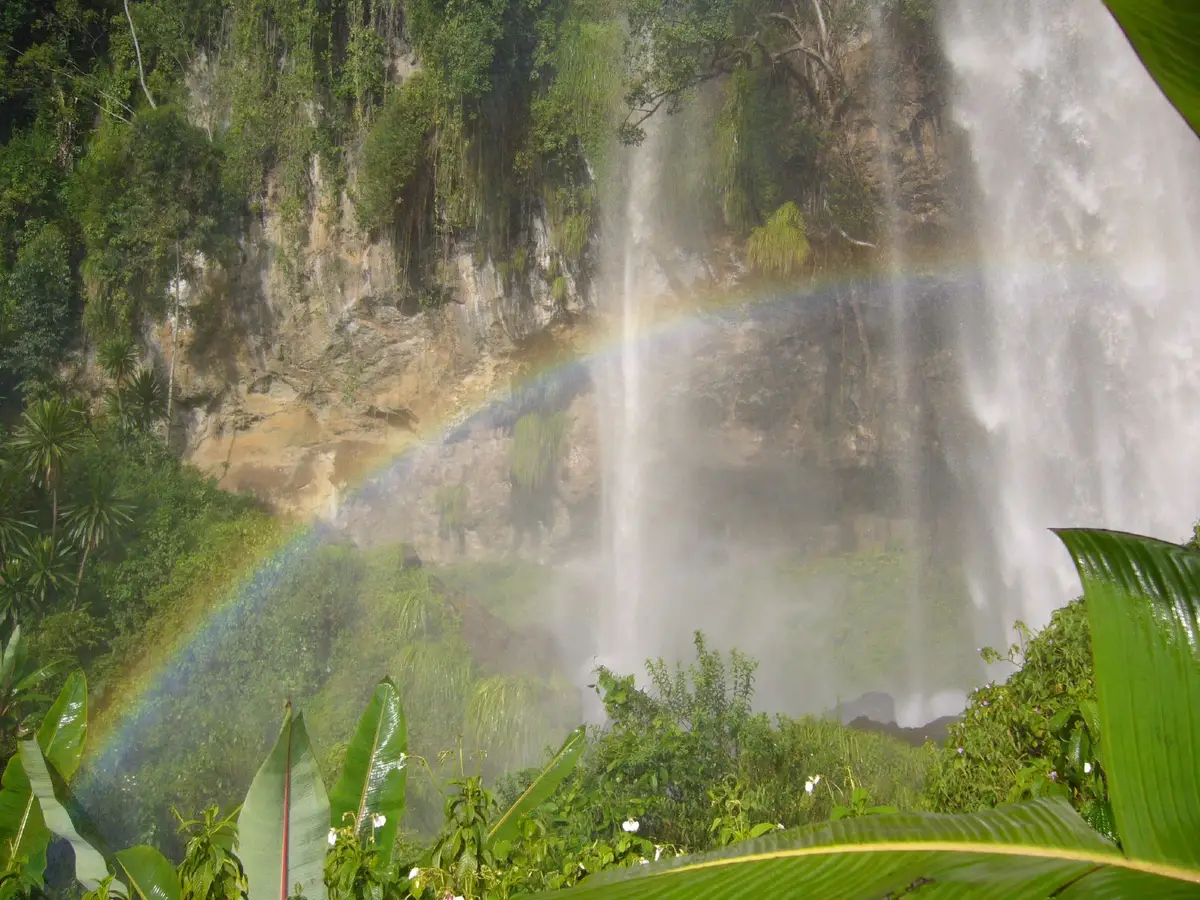 A rainbow in the spray of a waterfall at Sipi
